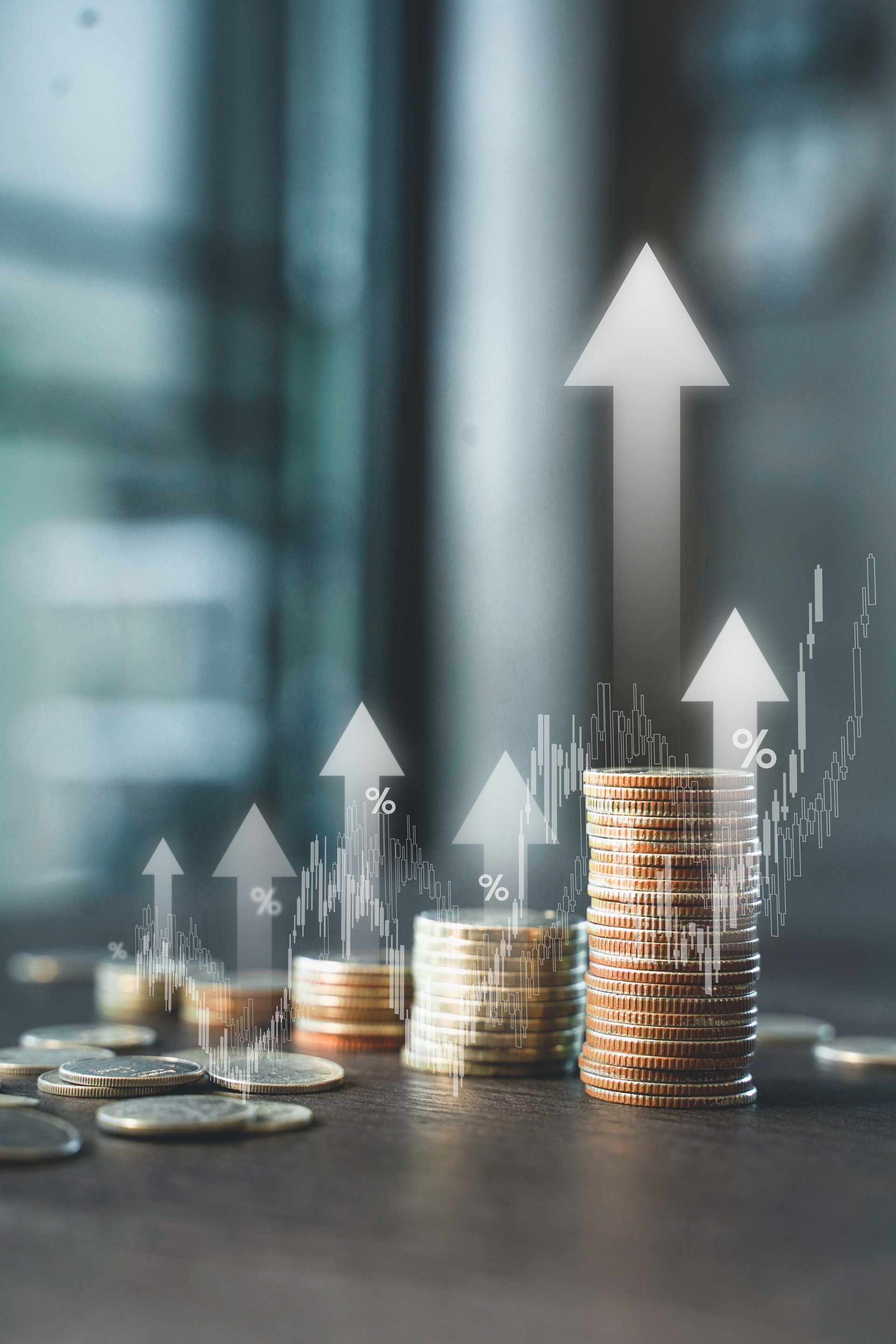 Stack of coins with up arrow and percentage symbol for finance bank increasing interest rate Stack of coins with up arrow and percentage symbol for finance bank increasing interest rate